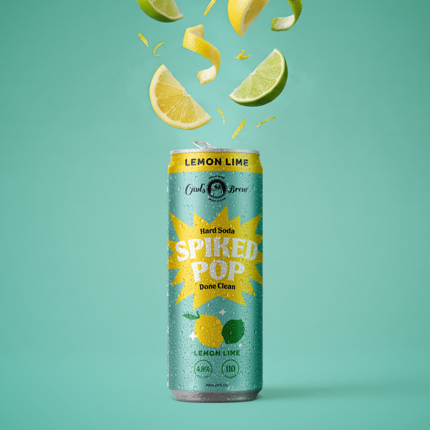 Can of spiked pop with lemon and lime slices on a teal background