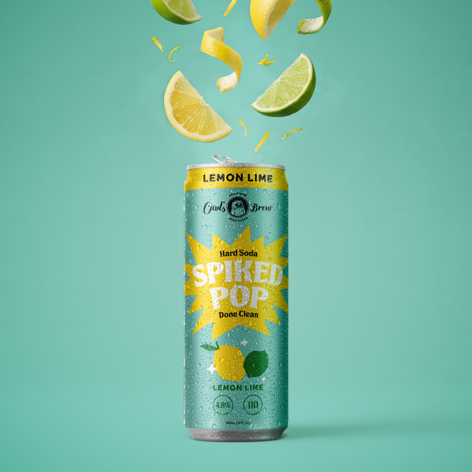 Can of spiked pop with lemon and lime slices on a teal background