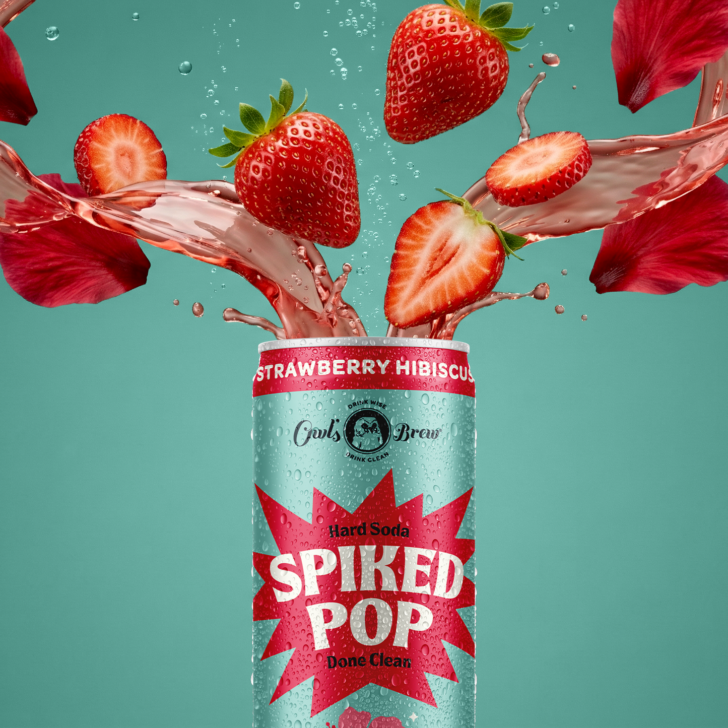Spiked Pop can with strawberries and red flowers against a teal background